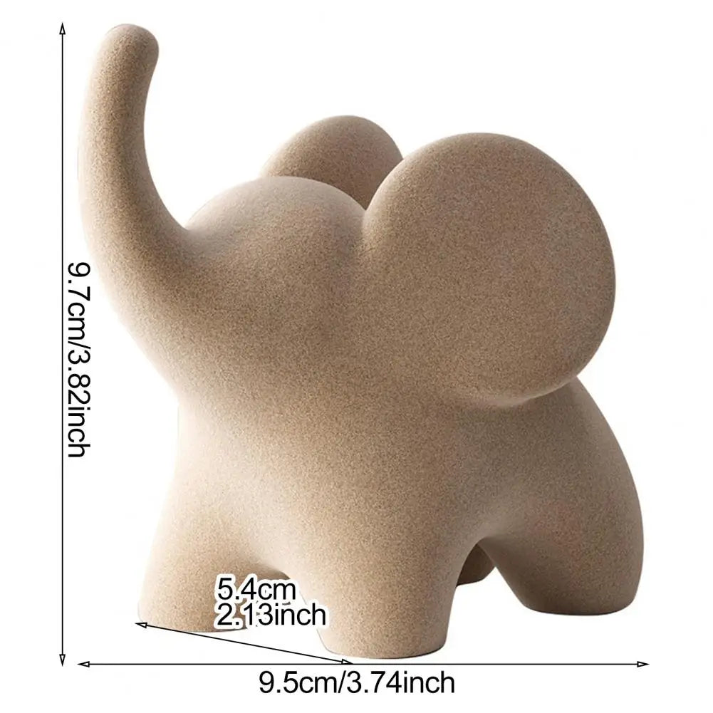 ELEVA™ – Escultura Decorativa de Elefante en Resina Flock Blanca
