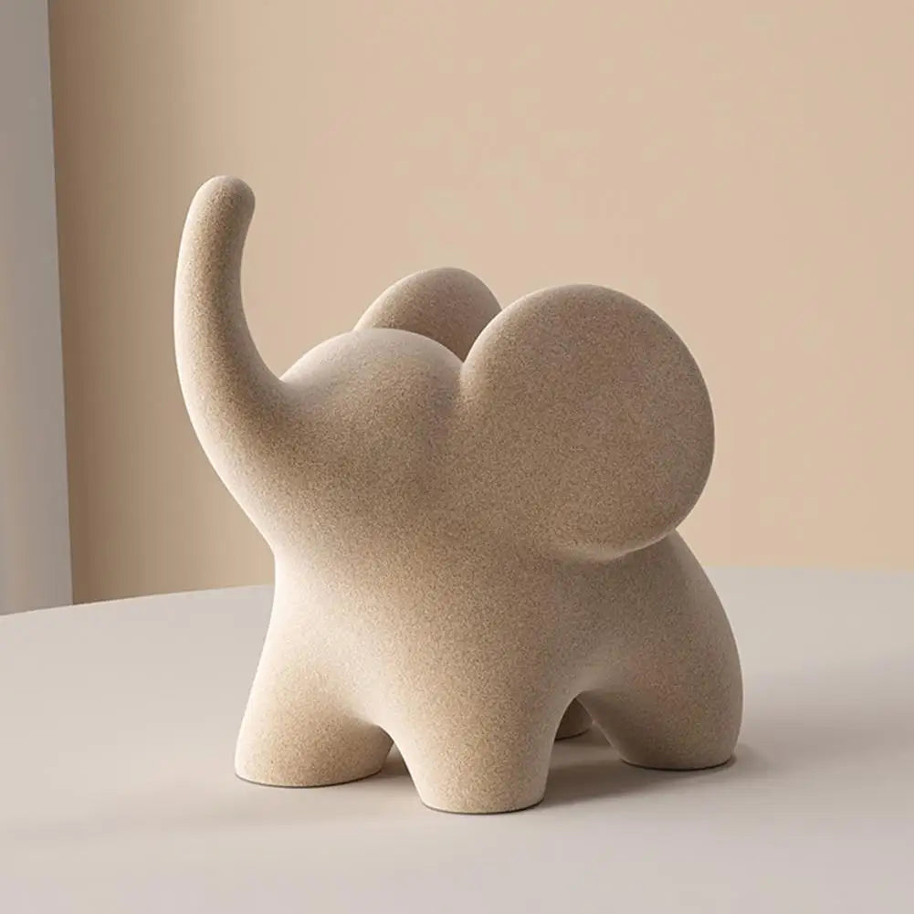 ELEVA™ – Escultura Decorativa de Elefante en Resina Flock Blanca