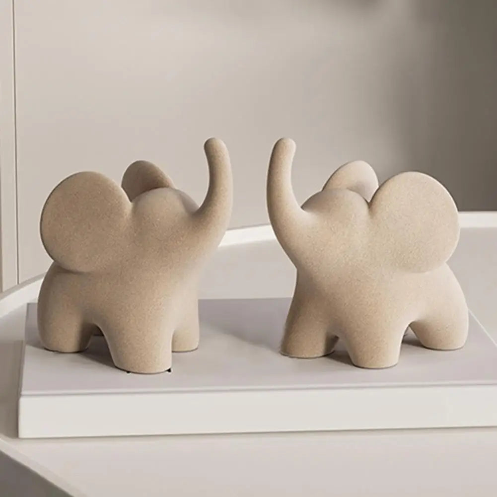 ELEVA™ – Escultura Decorativa de Elefante en Resina Flock Blanca