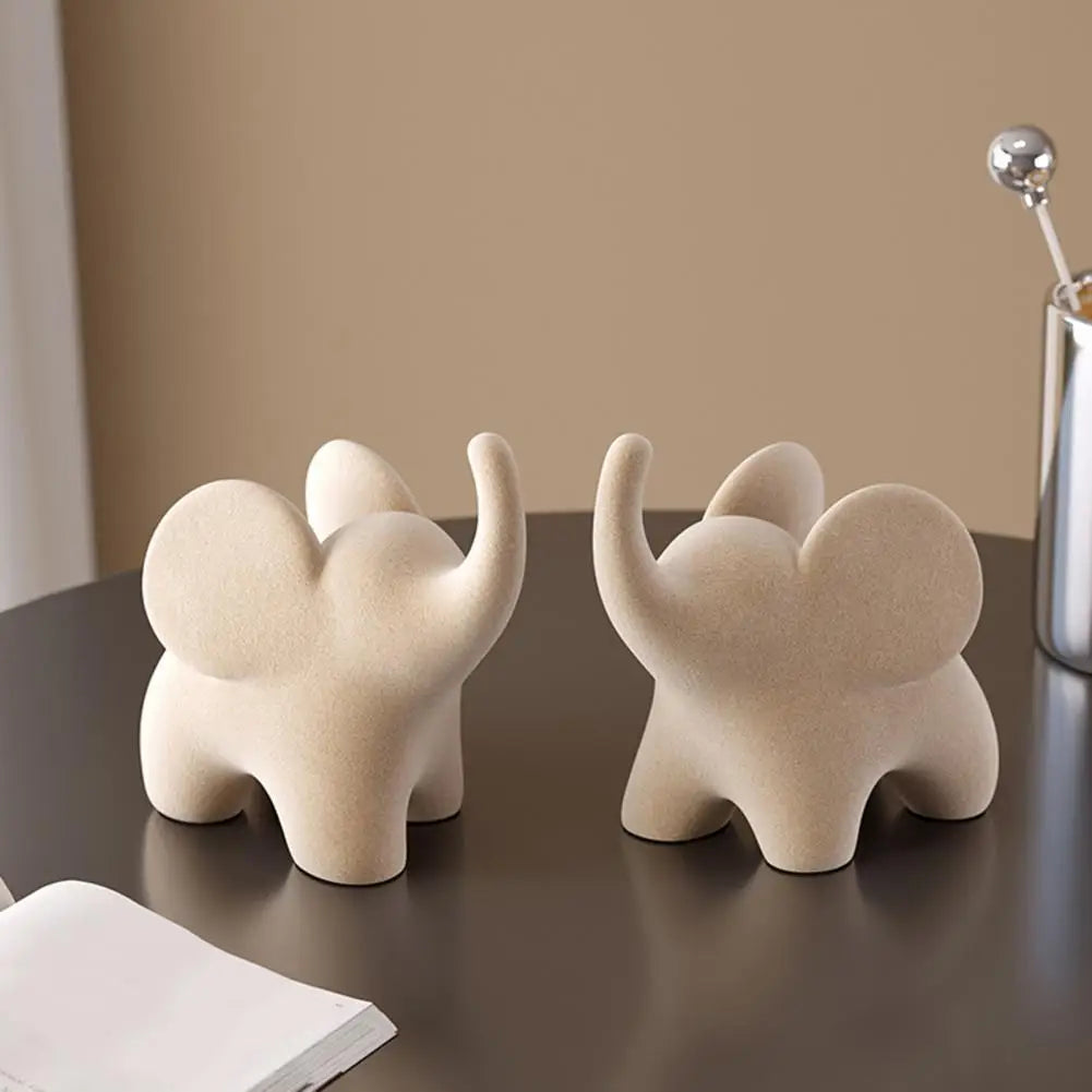 ELEVA™ – Escultura Decorativa de Elefante en Resina Flock Blanca